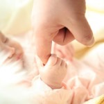 Baby's and daddy's hands thumbnail
